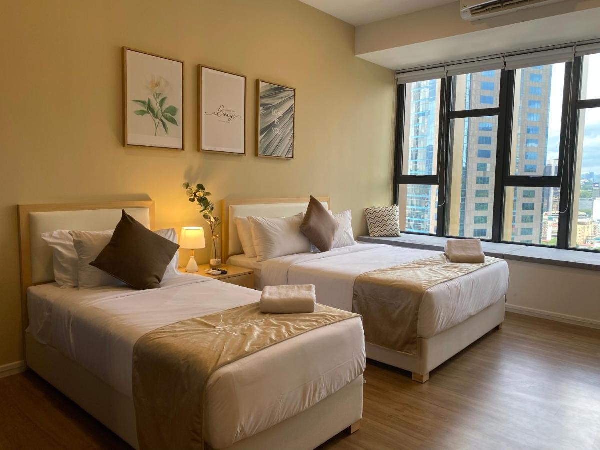 Ceylonz Suites By Mykey Kuala Lumpur Kültér fotó A typical bedroom at the hotel