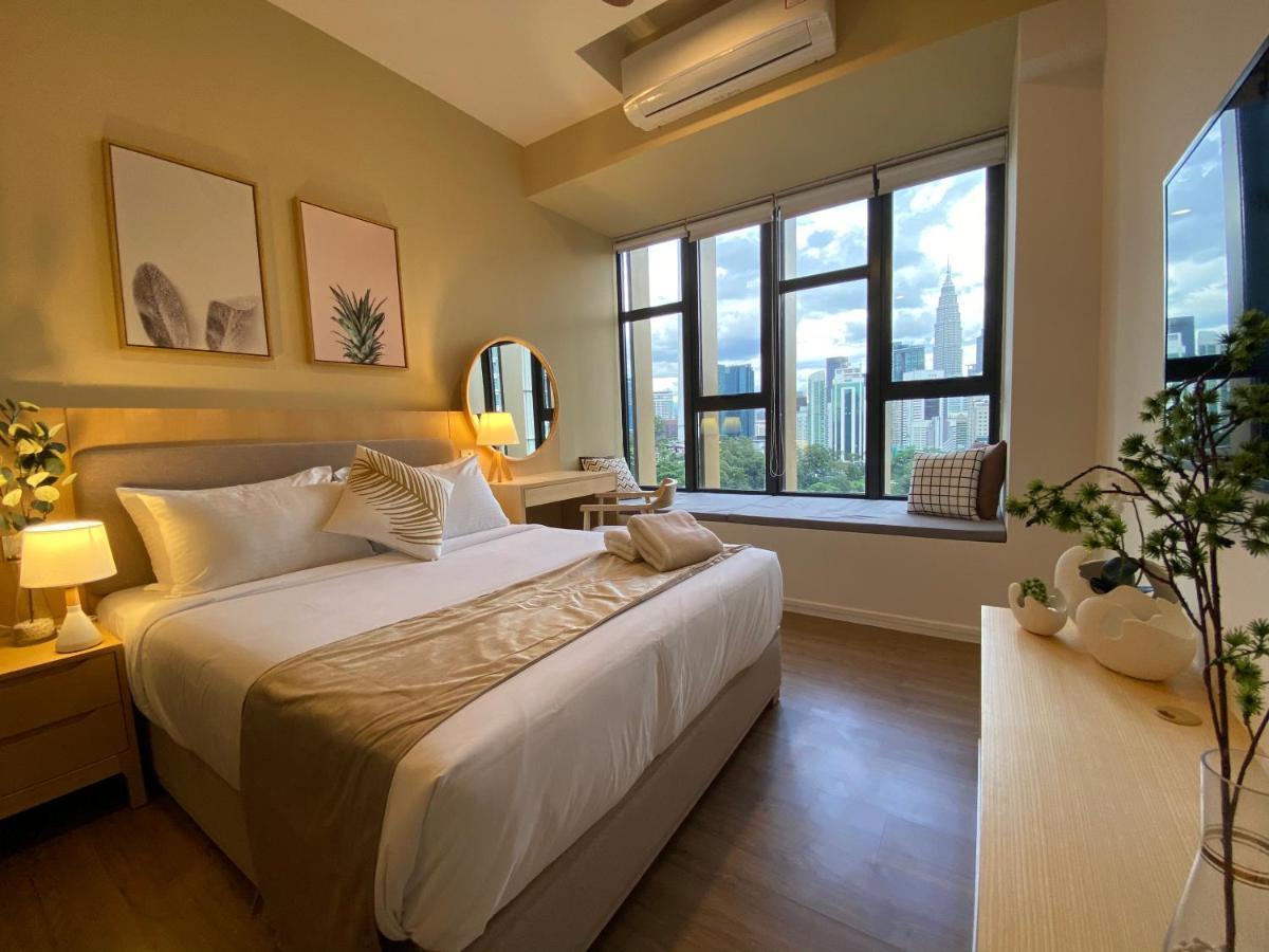 Ceylonz Suites By Mykey Kuala Lumpur Kültér fotó A bedroom at the hotel