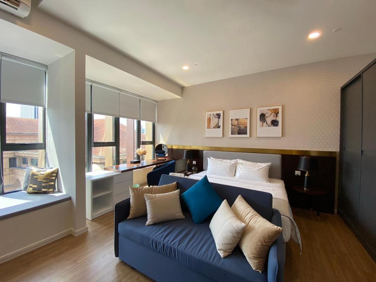 Ceylonz Suites By Mykey Kuala Lumpur Kültér fotó A bedroom at the hotel